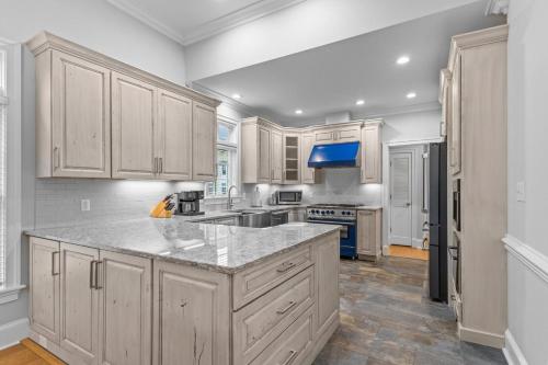 Kuchyň nebo kuchyňský kout v ubytování Posh Pelican home