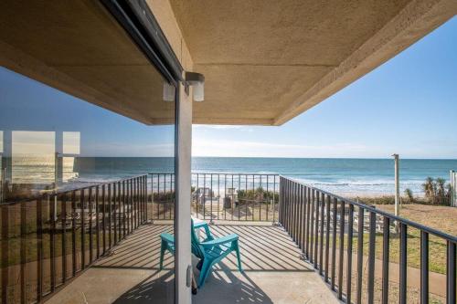 a balcony with a view of the beach at Summer Winds 231-B condo in Salter Path