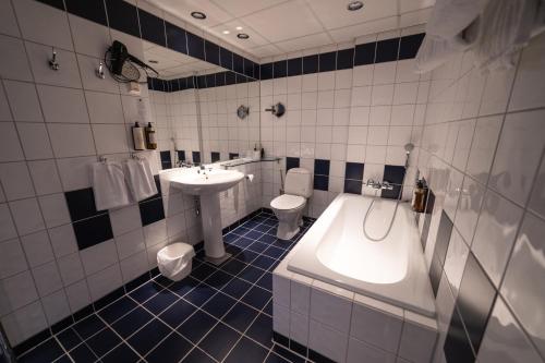 Koupelna v ubytování Hurdalsjøen Hotel & Spa
