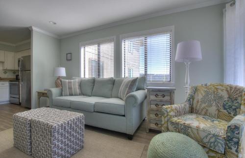 a living room with a couch and a chair at Southwinds J6 condo in Atlantic Beach