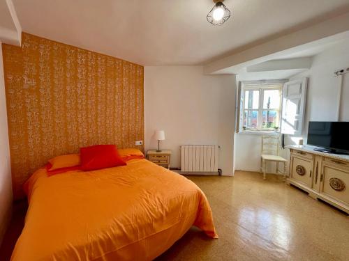 Postel nebo postele na pokoji v ubytování Casa Los Nogales de Ibio