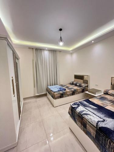 Una cama o camas en una habitación de COMFY ZONe