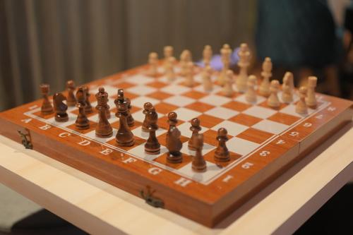 a chess board with chessetts on it on a table at Clarks Safari Haridwar in Haridwār