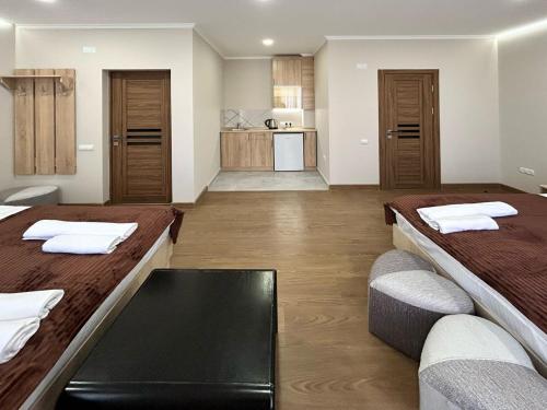 Postel nebo postele na pokoji v ubytování Guest House MARGARYAN