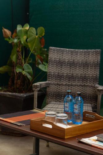 a tray with two bottles of water on a table at Trisan Resident Hotel in Nairobi