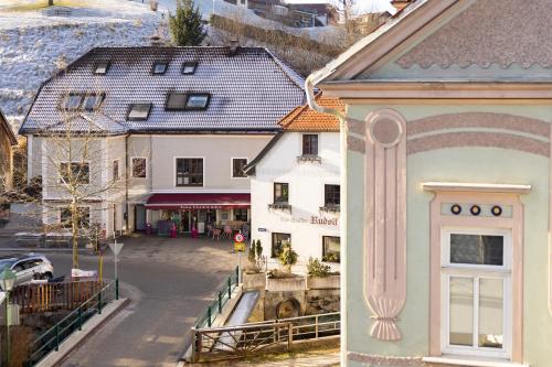 a view of a street in a town with buildings at Gasthof zum Goldenen Hirschen in Ybbsitz