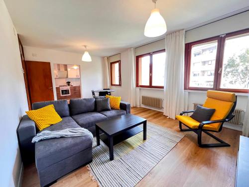 a living room with a couch and two chairs at Central Comfort 5 min walk to downtown Bassano in Bassano del Grappa