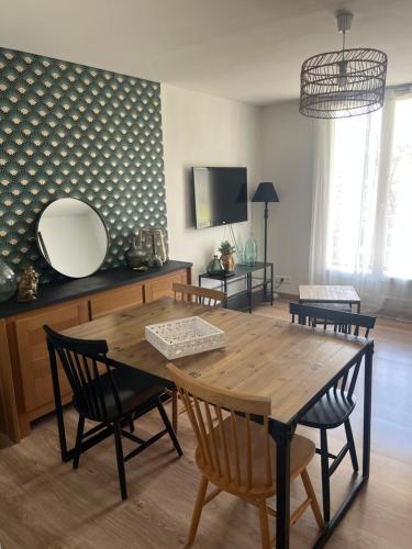 TV a/nebo společenská místnost v ubytování Appartement Cosy