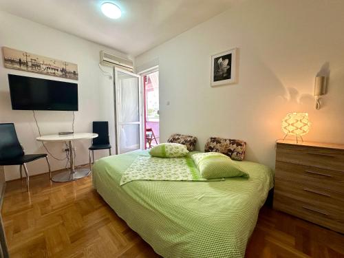 Llit o llits en una habitació de Happy Time Studio