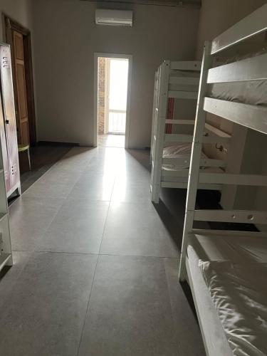 Postel nebo postele na pokoji v ubytování Jetpak Alternative Eco Hostel