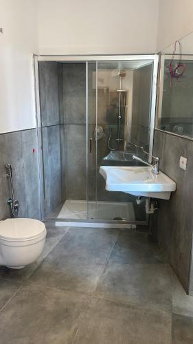 Koupelna v ubytování Hotel Paola