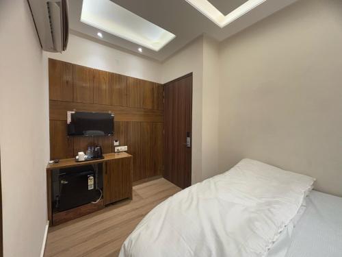 TV a/nebo společenská místnost v ubytování Hotel Moon Light