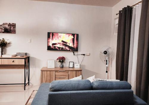 TV a/nebo společenská místnost v ubytování Family-Friendly Condo with Free Parking, Pool and Gym in Palawan - B2 7Beryl