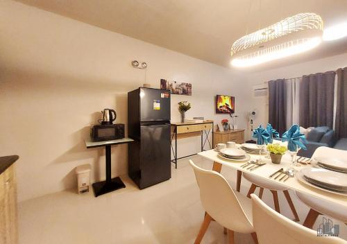 Kuchyň nebo kuchyňský kout v ubytování Family-Friendly Condo with Free Parking, Pool and Gym in Palawan - B2 7Beryl