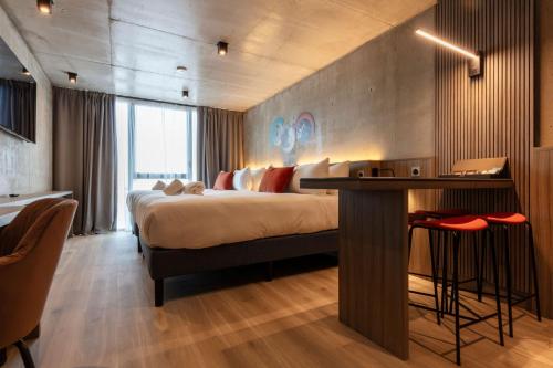 Katil atau katil-katil dalam bilik di Ki Space Hotel & Spa - near Disneyland Paris