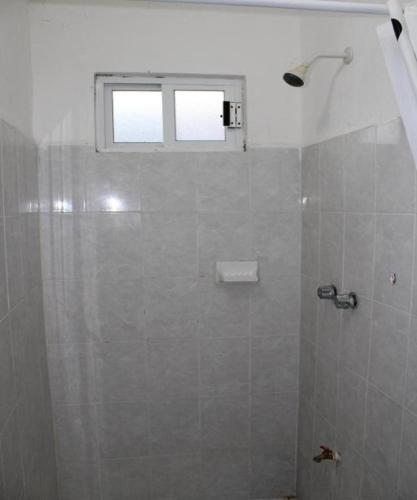 Koupelna v ubytování OYO Hotel Colibri