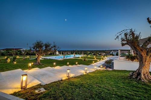 a group of lights in a park at night at Shalamu Luxury Apartments in Rosolini