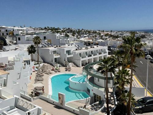 an aerial view of a resort with a swimming pool at Kikere Studios in Puerto del Carmen