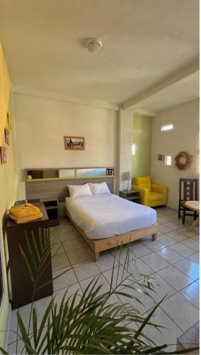 Katil atau katil-katil dalam bilik di OYO Hotel Museo Carnaval