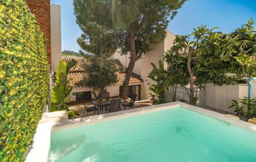 a swimming pool in the backyard of a house at Stunning Home In Algodonales With Wifi in Algodonales