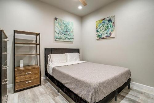 a small bedroom with a bed and a mirror at Unique Barn by the Lake in Bridgeport, Texas in Runaway Bay