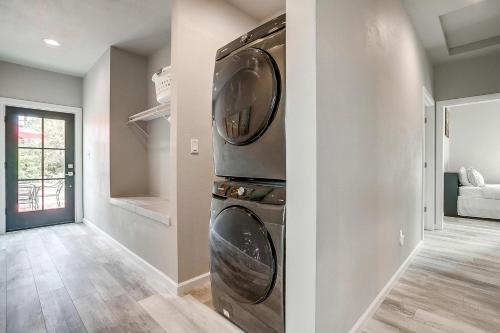 a laundry room with two washer and dryer at Unique Barn by the Lake in Bridgeport, Texas in Runaway Bay