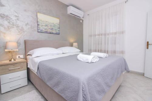 Posteľ alebo postele v izbe v ubytovaní Pool house LUKA