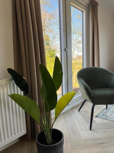 Posezení v ubytování Simmerwille B&B- Camping- Bootverhuur