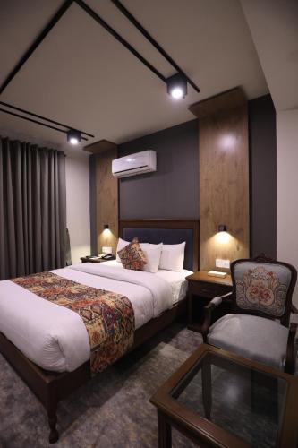 Postel nebo postele na pokoji v ubytování Destination Heritage Peshawar