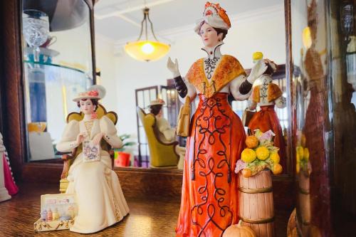 a group of figurines sitting on a table at The Eden Hall Inn in Charlottetown
