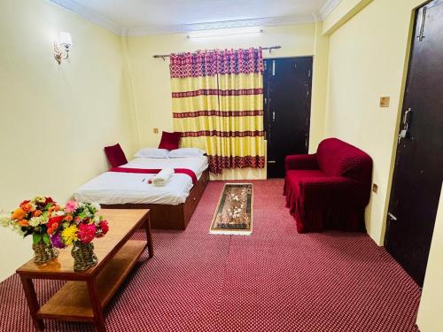 Postel nebo postele na pokoji v ubytování Kattel HomeStay And Apartments