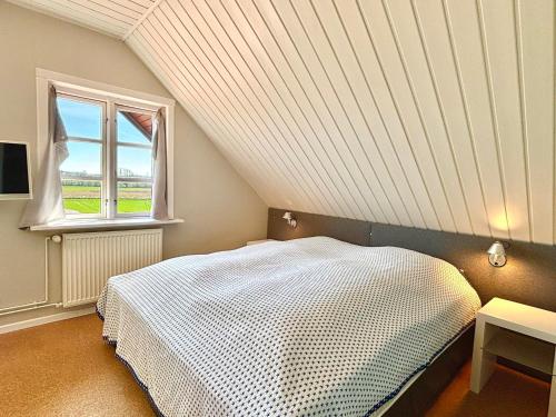 Postel nebo postele na pokoji v ubytování Strandgut Wackerballig
