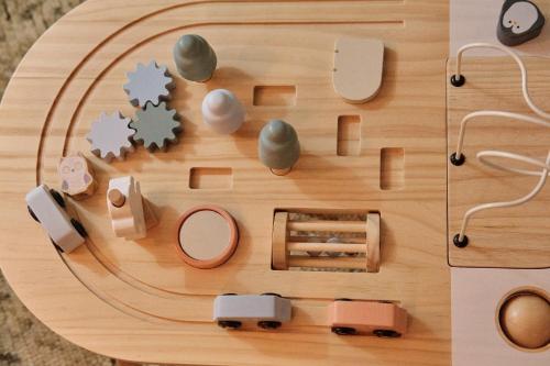 a wooden table with a toy train on it at Elysée Montmartre Hotel in Paris