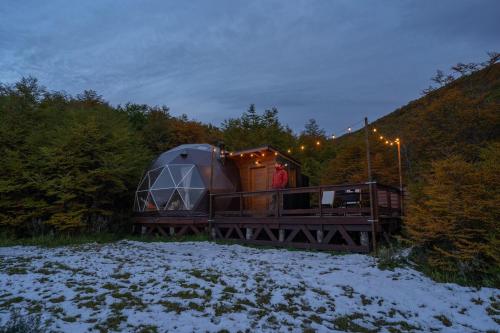 a tent on the back of a train in the snow at DOMO en Ushuaia Glamping in Ushuaia