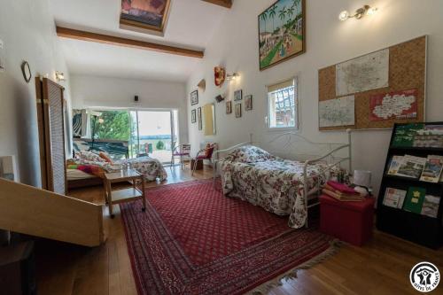 En eller flere senge i et værelse på Balanquier