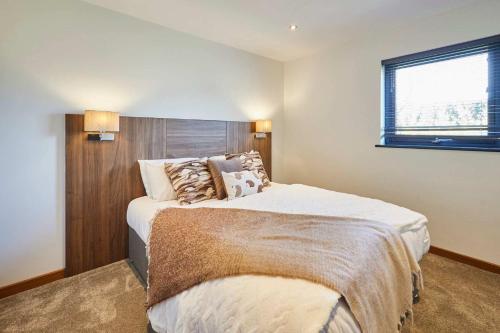 Ένα ή περισσότερα κρεβάτια σε δωμάτιο στο Host & Stay - Dalby Lodge
