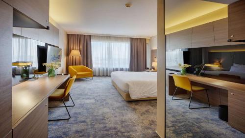 TV a/nebo společenská místnost v ubytování Radisson Blu Plaza Hotel Ljubljana