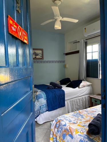 Postel nebo postele na pokoji v ubytování Casa dos Franceses Ilha Grande