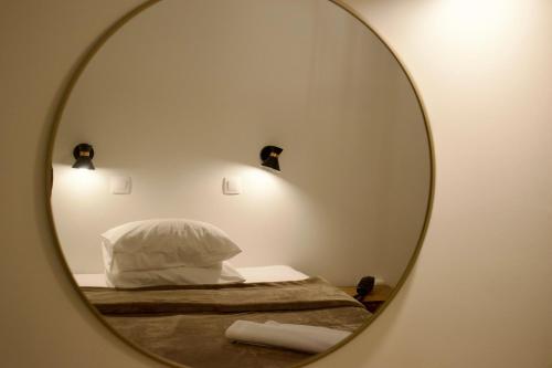 Postel nebo postele na pokoji v ubytování Nafsika Hotel Athens Centre