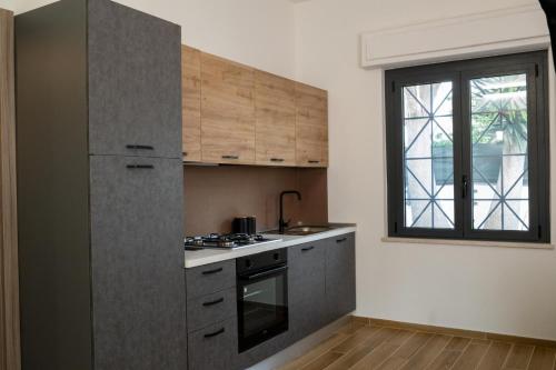 Kuchyň nebo kuchyňský kout v ubytování La Casa sul Mare