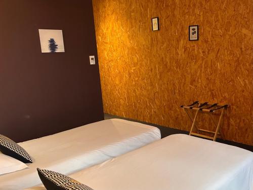 Ένα ή περισσότερα κρεβάτια σε δωμάτιο στο Fasthotel L'Eldorado