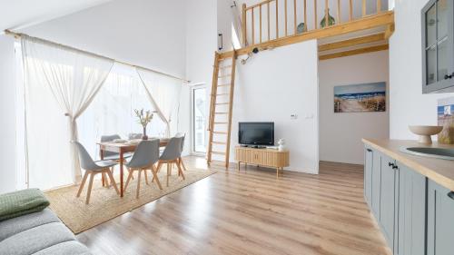 TV a/nebo společenská místnost v ubytování Słoneczne Apartamenty, Sun & Snow