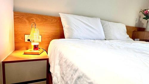 Ένα ή περισσότερα κρεβάτια σε δωμάτιο στο Onsen Ecopark Home
