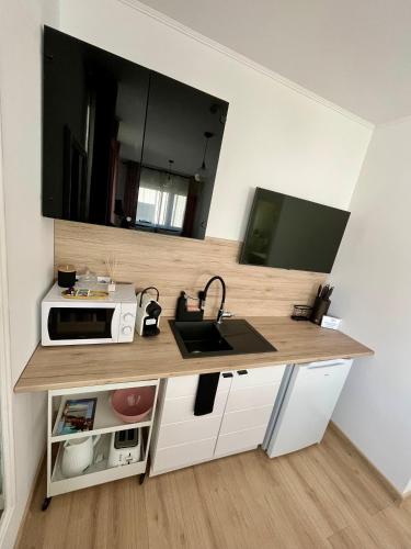 Dapur atau dapur kecil di Major Apartmanház