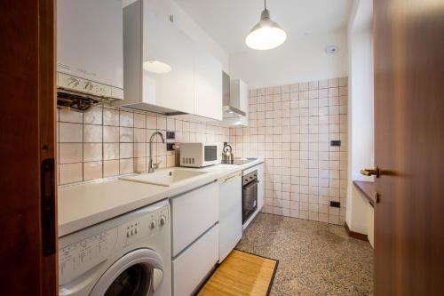 Cuisine ou kitchenette dans l'établissement Dimore Verona