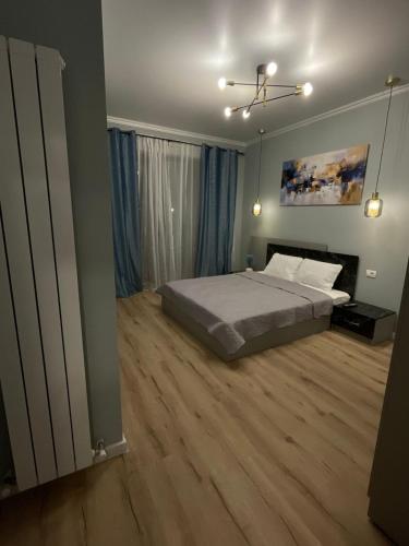 En eller flere senge i et værelse på Queens by the sea