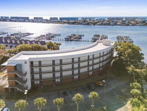 an aerial view of a hotel with a marina at Pirates Bay B315 - Bayfront Beauty in Fort Walton Beach