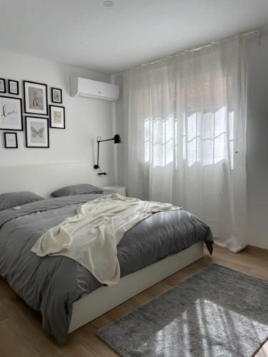 Postel nebo postele na pokoji v ubytování Little Rose apartment