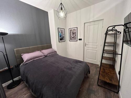 L'univers automobile au coeur de Mulhouseにあるベッド