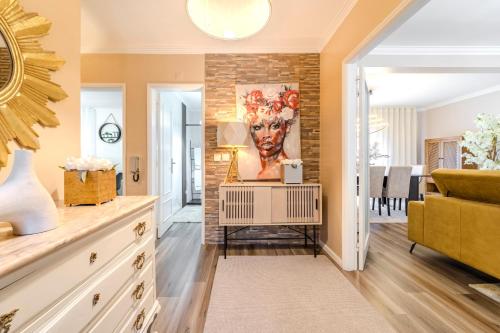 a living room with a brick wall at Maria Home Reall's in Braga